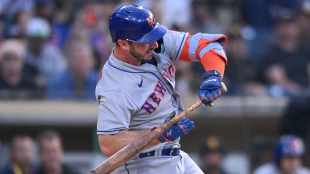 New York Mets first baseman Pete Alonso (20) reacts after being hit by a pitch.